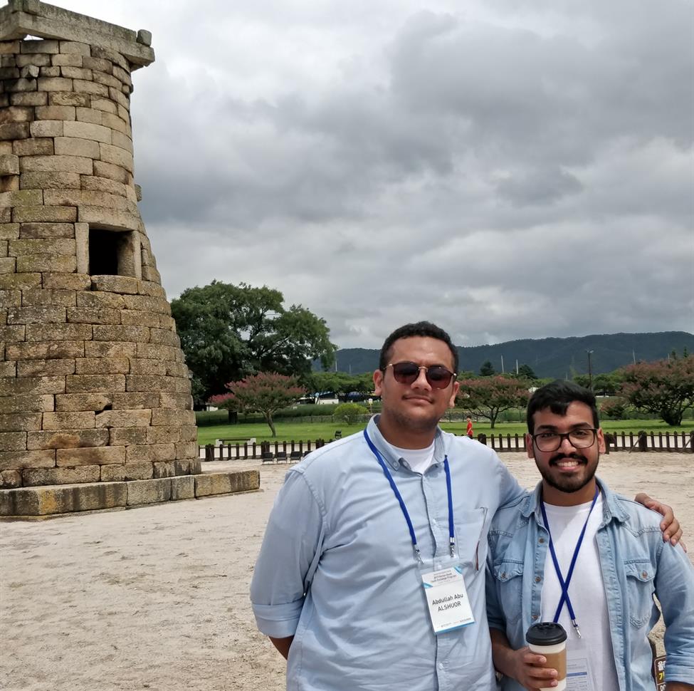 Abdullah Alshuour (left) and Ali Almuhanna (right) in front Cheomseongdae, one of the oldest astronomical observatories in Asia