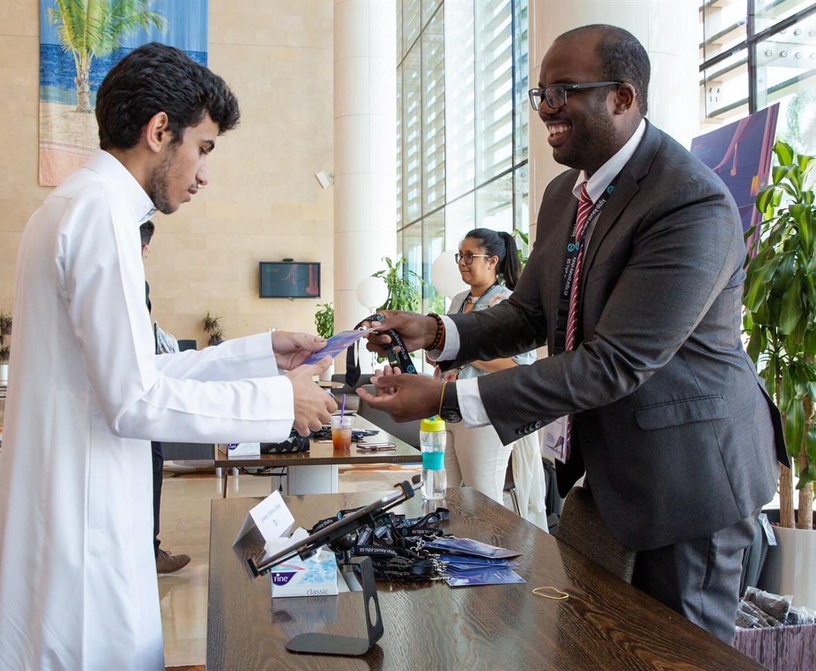 KGSP Student Advisor Stafford Oliver welcomes a new Cohort 11 student to the KAUST campus