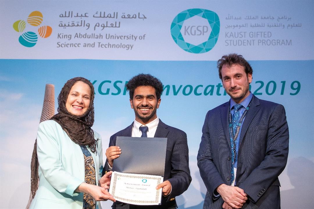 Motaz Aljadali, senior at Boston University, receives his KGSP graduation certificate. Motaz is the first KGSP graduate from Thuwal village. Motaz Aljadali, senior at Boston University, receives his KGSP graduation certificate. Motaz is the first KGSP graduate from Thuwal village.