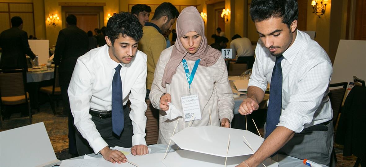 Marwan (left) working on a team project at the 2018 Convocation in Phoenix, AZ